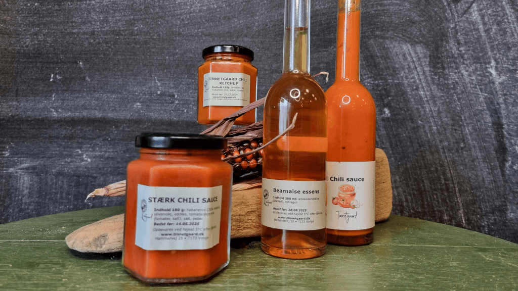 Chili sauce, chili ketchup, and Béarnaise essence from Tinnetgaard on a table